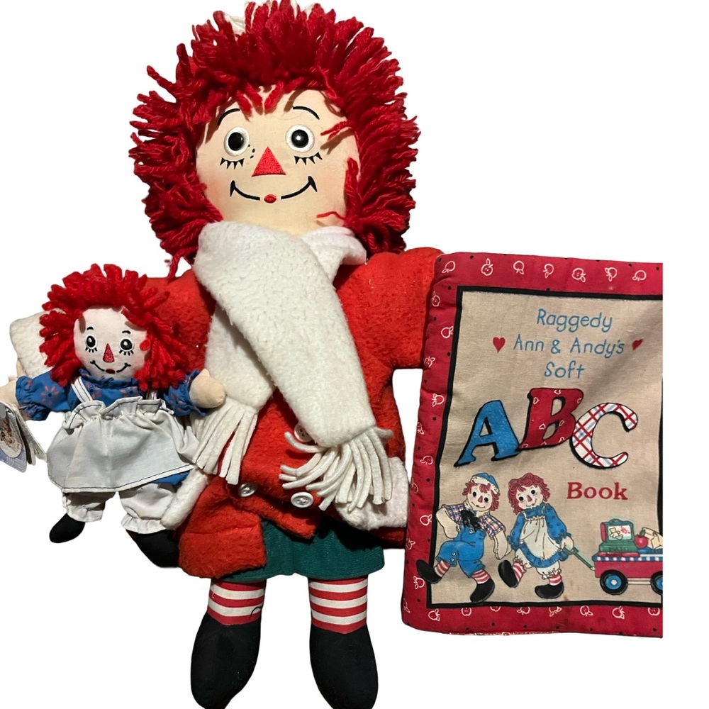 Raggedy Anne trio 85 year ,90 year anniversary Ann dolls and a material book